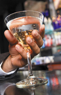 Patron holding glass